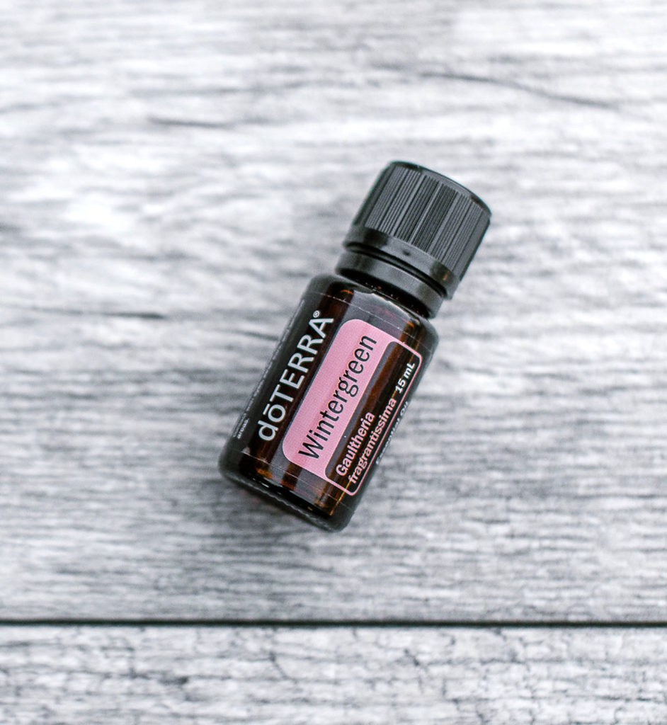doTERRA wintergreen essential oil bottle lying flat