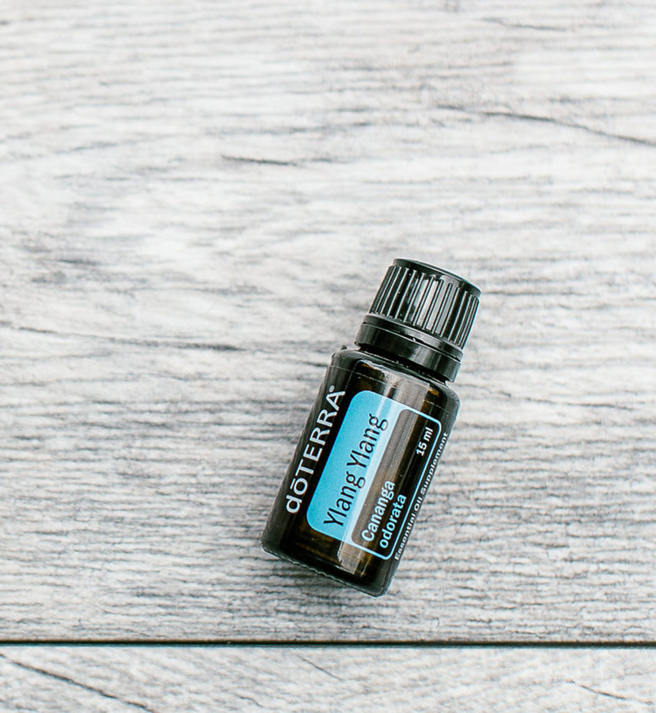 doTERRA ylang ylang essential oil bottle lying flat
